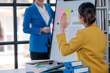 Fototapete - Shot of a group of businesspeople sitting together in a meeting.