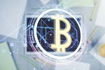 Poster - Double exposure of creative Bitcoin symbol hologram and modern digital tablet on background. Mining and blockchain concept
