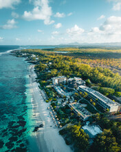 Aerial View Of A Hotel Resort Along The Coastline On The Beachfront In Poste Lafayette, Flacq District, Mauritius.