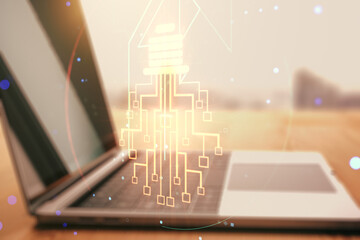 Aufkleber - Double exposure of creative light bulb hologram with chip on laptop background, idea and brainstorming concept
