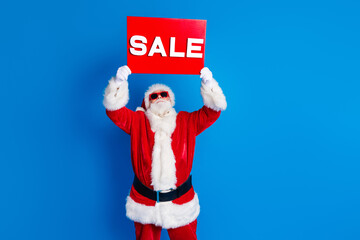 Wall Mural - Photo portrait of aged senior man look up sale raise plant wear trendy santa claus costume coat isolated on blue color background