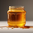 Fondo con detalle y textura de tarro de cristal con miel, sobre fondo de tonos neutros