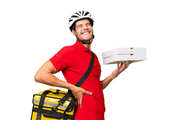 Wall Mural - Pizza delivery man with work uniform picking up pizza boxes over isolated background suffering from backache for having made an effort