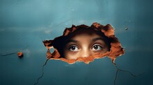  A Child's Face Peeks Out Of A Hole In A Wall That Has Been Painted Blue And Has Been Torn Open To Reveal A Hole In The Wall.