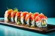 Sushi roll with salmon, avocado and cucumber on blue background