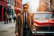 A suave man in a classic overcoat and sunglasses strides confidently on an urban street, a vintage red car and city life bustling in the background.