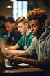 © piai - Teen students learning on laptop computers in ful modern classroom with wooden desks