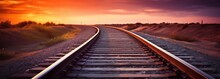 Railway Track In The Sunset