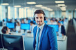 Confident customer support representative at a bustling modern office. Close-up of a cheerful male professional with headset ready to assist.