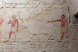 SAQQARA, EGYPT - MARCH 23, 2023:  Pictures from the inner walls  in the Saqqara necropolis, Egypt that includes Step Pyramid of Djoser
