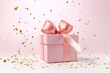pink gift box with ribbon and bow, copy space background