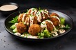 Crispy chickpea balls with tahini sauce and salad on a plate, isolated background with text space.
