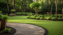 Garden Landscape Design With Pathway Intersecting Bright Green Lawns And Shrubs White Sheet Walkway In The Garden. Landscape Design With Colorful Shrubs. Grass With Bricks Pathways. Lawn Care Service.
