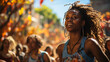 Junge afroamerikanische Frau mit Dreadlocks tanzt auf einem Musikfestival. 