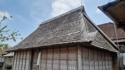 Traditional Balinese house called Bale Manten. Bale Manten is a rectangular building and is divided into two parts (left and right). Used as a residence for parents and daughters. Using bamboo as wall