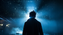 Silhouette Of A Guy, A Man View From The Back Against A Background Of Blue Fog And Rays Of Light, A Fictional Character Computer Graphics