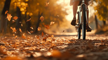 Bicycle In Motion Autumn Background Wheels Leaves Flying In Autumn Park Fall Sunny Day