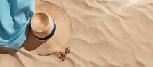 Female sunglasses straw hat and beach towel arranged on beach sand Minimalistic lifestyle fashion content for blogs magazines and social media Enjoy sunbathing and relaxing during summer travel