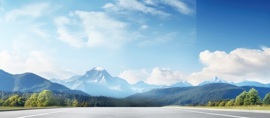 Wall Mural - Desolate road with mountain landscape and blue sky Copy space image Place for adding text or design