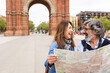 © Xavier Lorenzo - Happy senior couple with a touristic map enjoying vacation together. Two mature retired people having fun sightseeing in Barcelona. Elderly travelers lifestyle concept. Copy space for text.