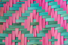 Close Up Pink And Green Bamboo Basketry Woven Pattern Background.