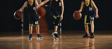 Fototapeta  - Basketball Training Unit For Youth Players. Youth Basketball Players in a Team on Training Drill. Young Boys on Basketball Bractice