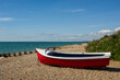 Beach with boat at East Preston near Littlehampton, West Sussex,  England