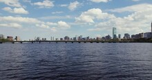 Low Flying Over Charles River Toward Harvard Bridge And Boston City Skyline
