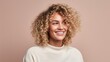 © Hope - Smiling young woman with blonde curly groomed hair isolated on pastel flat background with copy space. Blonde hair care products banner template, hair salon.