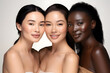 © Oksana - Beautiful happy smiling women together, white skin woman, asian woman and African woman. Multiethnic Diversity concept.