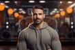 © CogniLens - Portrait of a blissful man in his 30s dressed in a warm wool sweater against a dynamic fitness gym background. AI Generation