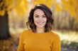 © CogniLens - Portrait of a smiling woman in her 30s wearing a cozy sweater against a bright and cheerful park background. AI Generation