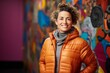 Portrait of a content woman in her 40s sporting a quilted insulated jacket against a vibrant yoga studio background. AI Generation