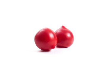 Two pink tomatoes isolated on white background.