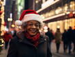 © kalafoto - business people wearing a Santa hat walks down the street on Christmas night