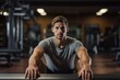 Headshot portrait photography of a serious boy in his 30s doing sit ups in a gym. With generative AI technology