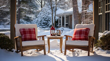 Cozy Chairs On A Porch Draped In Snow, Perfect For Winter Reading.