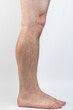 Clean man legs side view isolated
