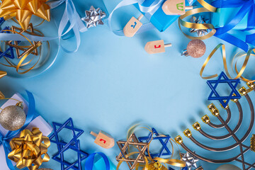 Wall Mural - Happy Hanukkah greeting card background. Jewish New Year holiday flat lay with traditional symbols of hanukkah festival, menorah, donuts and decorations copy space