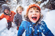 © maribom - Children playing outdoors on a snowy day. Faces with joy and excitement