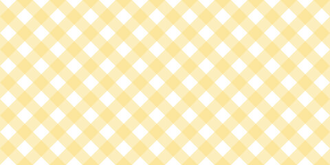 Gingham diagonal seamless pattern in yellow pastel color. Vichy plaid design for Easter holiday textile decorative. Vector checkered pattern for fabric - picnic blanket, tablecloth, dress, napkin.