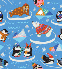 Wall Mural - Seamless vector pattern with cute cartoon penguins, polar bear and walrus wearing in sweaters, hats and scarves on blue background