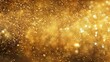 Gold glitter sparkles on a dark background