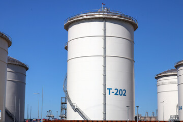 Wall Mural - (Meerdere waarden)Oil storage tanks at the Maasvlakte harbor as part of the port of Rotterdam