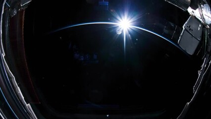 Wall Mural - rising sun over planet earth seen from space. flying over planet earth. view from international spac