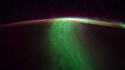 Wall Mural - northern lights over planet earth seen from space. view from international space station. public dom