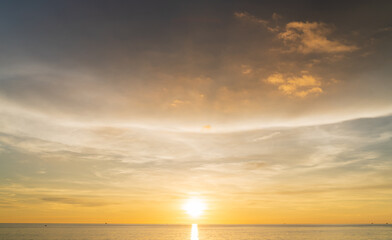 Wall Mural - abstract amazing scene of stuning colorful sunset or sunrise with clouds background in nature and tr
