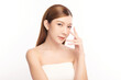 © kitthanes  - Beautiful young asian woman with clean fresh skin on white background, Face care, Facial treatment, Cosmetology, beauty and spa, Asian women portrait.