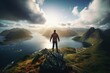 © Rudsaphon - Man standing on the top of a mountain and enjoying the view