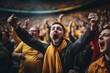 The emotions of football fans overwhelm the fans applauding in the stands